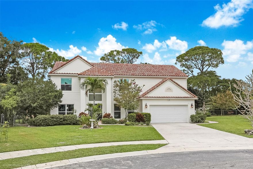 Welcome to this beautifully reimagined home in one of Palm Beach Garden’s most sought-after family neighborhoods. Completely renovated in 2024, this home sits on a spacious 0.3-acre lot, tucked away on a quiet cul-de-sac. Featuring 4 bedrooms, 3 full bathrooms and an office, new flooring throughout,spa-inspired bathrooms,with a steam shower in the primary bathroom,and a stunning chef’s kitchen with top-of-the-line Sub-Zero appliances,custom cabinetry,quartz countertops and backsplash,and a statement range and hood. Brand new impact windows throughout provide peace of mind, while the enclosed patio creates an ideal dining or gathering space. Outdoors-enjoy a newly resurfaced pool with sun shelf,marble deck,new screen enclosure, lush clusia hedges for privacy,brand-new irrigation system.