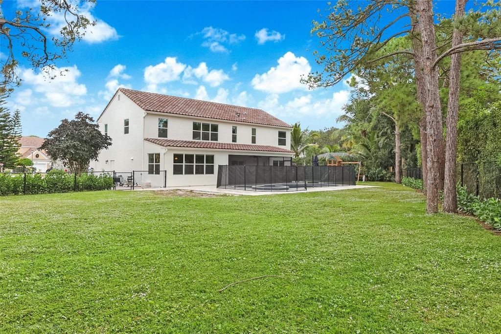 Photo of 12901 Marsh Pointe Way, Palm Beach Gardens, FL 33418 (MLS # F10542133)