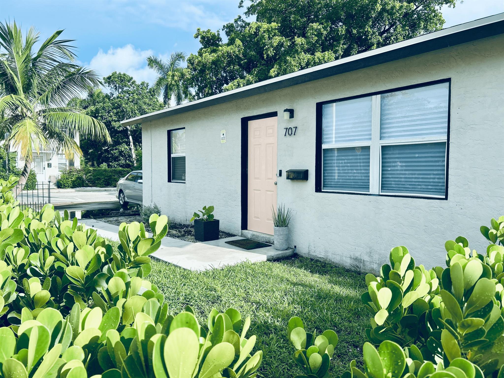 Live the Laid-Back Beach Life with Vibrant Downtown Vibes!Beautiful natural light fills this spacious 2-bedroom, 2-bath single-family home, creating a bright and uplifting atmosphere perfect for both eclectic downtown living and relaxed beach town vibes!Located just 2 blocks from downtown and only 1 mile from the Lake Worth Beach, this home places you in the heart of everything while offering privacy and comfort!Enjoy your own private backyard, featuring lush green grass, a fruiting mango tree, and patio furniture with a sun umbrella ideal for outdoor living and entertaining!- Private off-street parking for up to 4 vehicles- Indoor laundry room with washer & dryer- Central A/C and newer kitchen appliances- No HOA