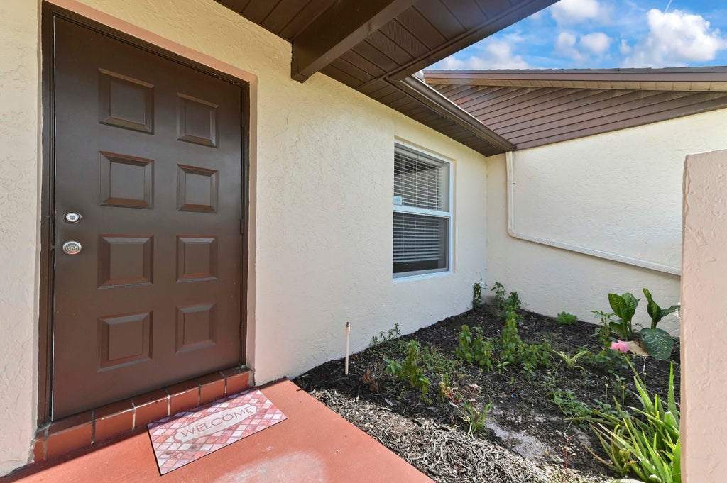 Photo of 8495 Lake Point Court, Lake Worth, FL 33467 (MLS # B26013477)
