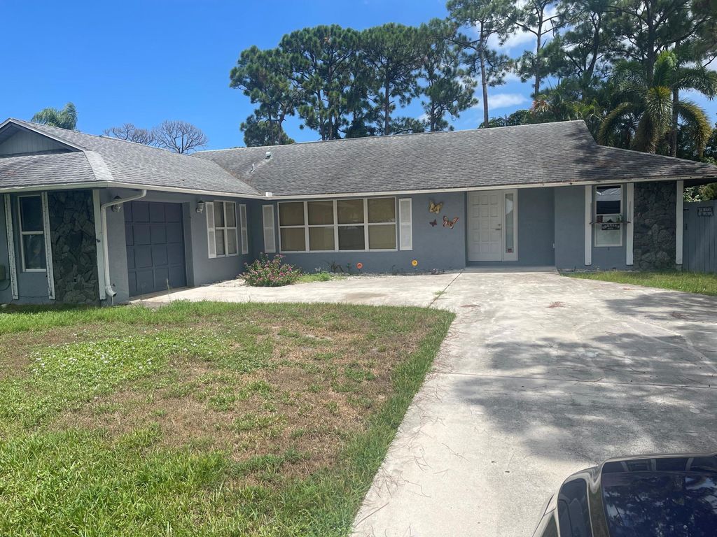 Photo of 1621 SE Fairfield Street, Port Saint Lucie, FL 34983 (MLS # R11011789)