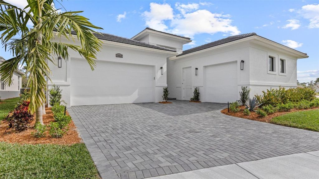 Photo of 13814 SE Chantilly Trace, Port Saint Lucie, FL 34984 (MLS # F10541740)