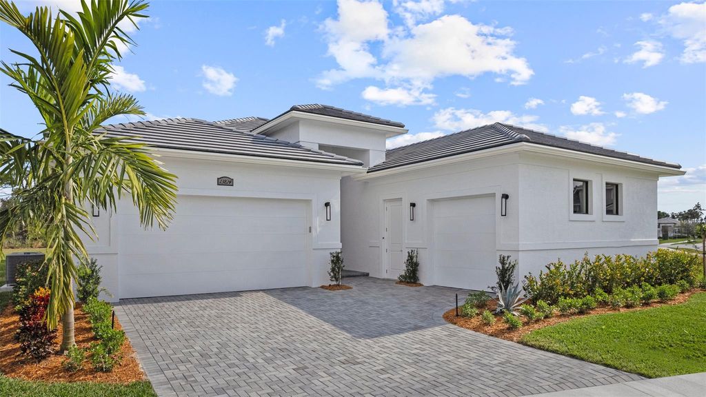 Photo of 13814 SE Chantilly Trace, Port Saint Lucie, FL 34984 (MLS # F10541740)