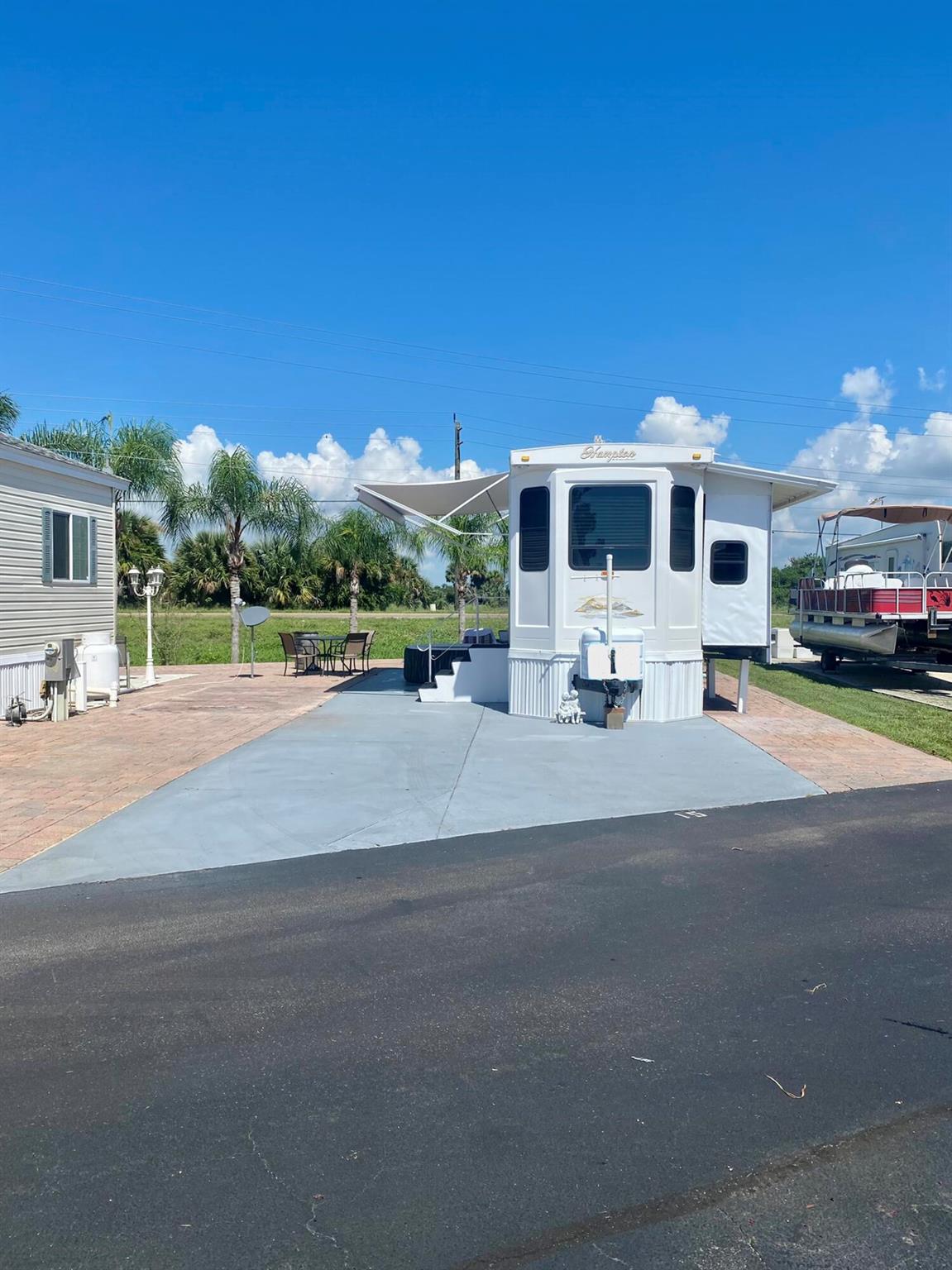 Cozy Hampton cottage located in the active 55+ Big O RV Resort, where you own your own land. Move in ready and fully furnished, new flooring, stackable washer & Dryer. Bring your boat there's room for storage and boat ramp to the canal that leads into lake Okeechobee.