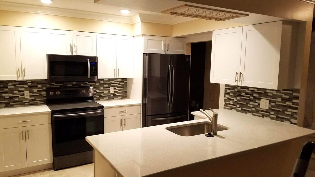 Photo of 1447 Lake Mango Way, West Palm Beach, FL 33406 (MLS # R10891351)