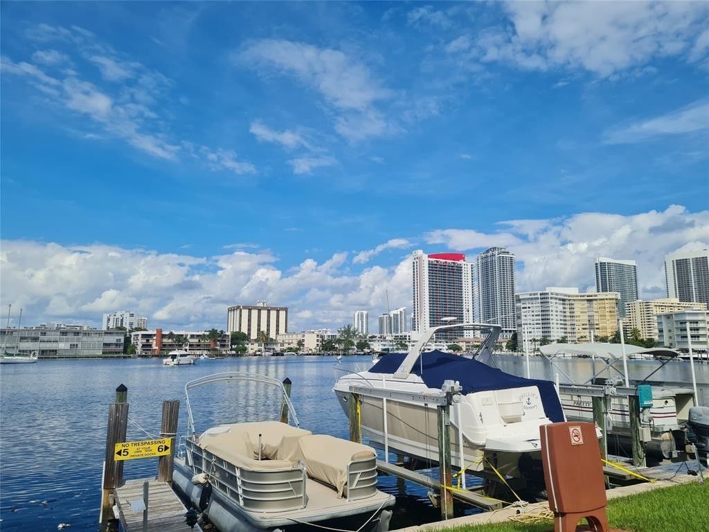 Photo of 300 Golden Isles Drive #104, Hallandale Beach, FL 33009 (MLS # B26026816)