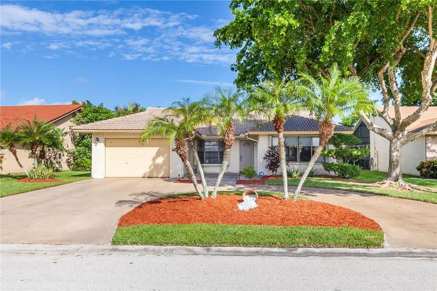 A PERFECT 2BR/2BA HOME WITH ENCLOSED FLORIDA ROOM, SCREENED IN PATIO WITH POOL & SPA. 55+ COMMUNITY. Lovely curb appeal with 1.5 garage and circular driveway. Updated kitchen with maple cabinets, granite counters and stainless steel appliances. Home features include tile flooring, carpeting and vaulted ceilings. Home is equipped with accordion shutters for your protection.  Central location close to loads of dining and shopping choices. MOVE IN READY!