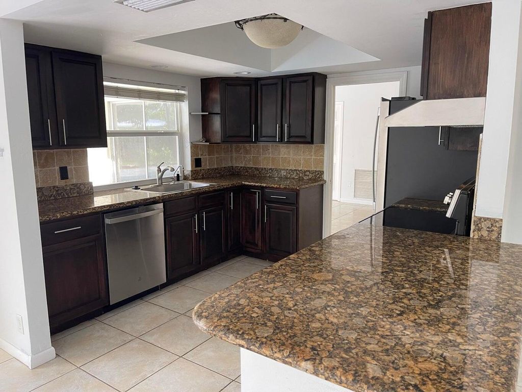 Photo of 898 SW 14th Drive, Boca Raton, FL 33486 (MLS # R11072088)