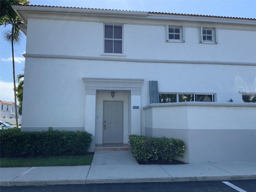 This beautiful corner townhome, located in a gated community with security guard. Featuring 4 bedrooms and 3 full baths, including a main floor bedroom and bath for convenience, tile and laminate floors, private front yards. Community pool, gym and 2 assigned parking spaces in front of the unit. Shopping centers, schools, parks and I-75 just minutes away, accessibility is effortless.
