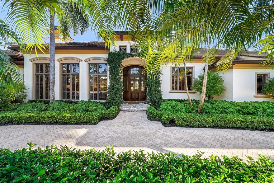 BEST VALUE IN OLD MARSH GOLF CLUB!  This Palm Beach Inspired Single Story Estate at Prestigious Old Marsh Golf Club enjoys optimal Southern Exposure with Sunlit Interiors that showcase Soaring 14' Ceilings. Natural Light illuminates all Main Living Areas of this Beautifully Appointed 3 Bdrm, 3.5 Bath + Library Residence. The Grand Entry Leads to an Expansive Great Room Overlooking a Tranquil Preserve for Ultimate Privacy. A Luxurious Primary Wing enjoys a Generously sized Marble Spa Primary Bath w/ Dual Water Closets, a Fabulously Spacious Walk-in-Closet and a Separate Sitting/Fitness Room! Impact Windows and Doors, a Gracious Circular Drive, 2-Car Plus Golf Cart Garage & a Resort-Style Pool, Spa, and BBQ Summer Kitchen Complete this Extraordinary Offering in Old Marsh Golf Club! Old Marsh Golf Club Is a Distinguished Gated Community Featuring an 18-Hole Pete Dye Championship Course and Just 180 Homes, Creating an Intimate Setting of Unparalleled Exclusivity. The Club Operates Without Tee Times, Is Celebrated for Its Renowned Caddie Program, and Is Deeply Committed to Preserving the Integrity of the Game and the Land. A Certified Audubon Cooperative Sanctuary, Old Marsh Reflects a Dedication to Environmental Stewardship and Harmony with the Native Habitat. Often Called a "Purist Club," It Appeals to Those Who Cherish the Tradition, Purity, and Natural Beauty of Golf. Just Minutes from the Finest Shopping, Dining, Cultural Venues, and the Atlantic Coastline, This Home Offers Both Sanctuary and Access  a Rare Combination in the Palm Beaches.