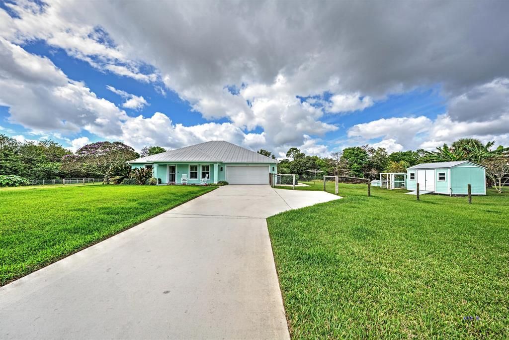 Photo of 5740 SE Ault Avenue, Stuart, FL 34997 (MLS # R10782964)