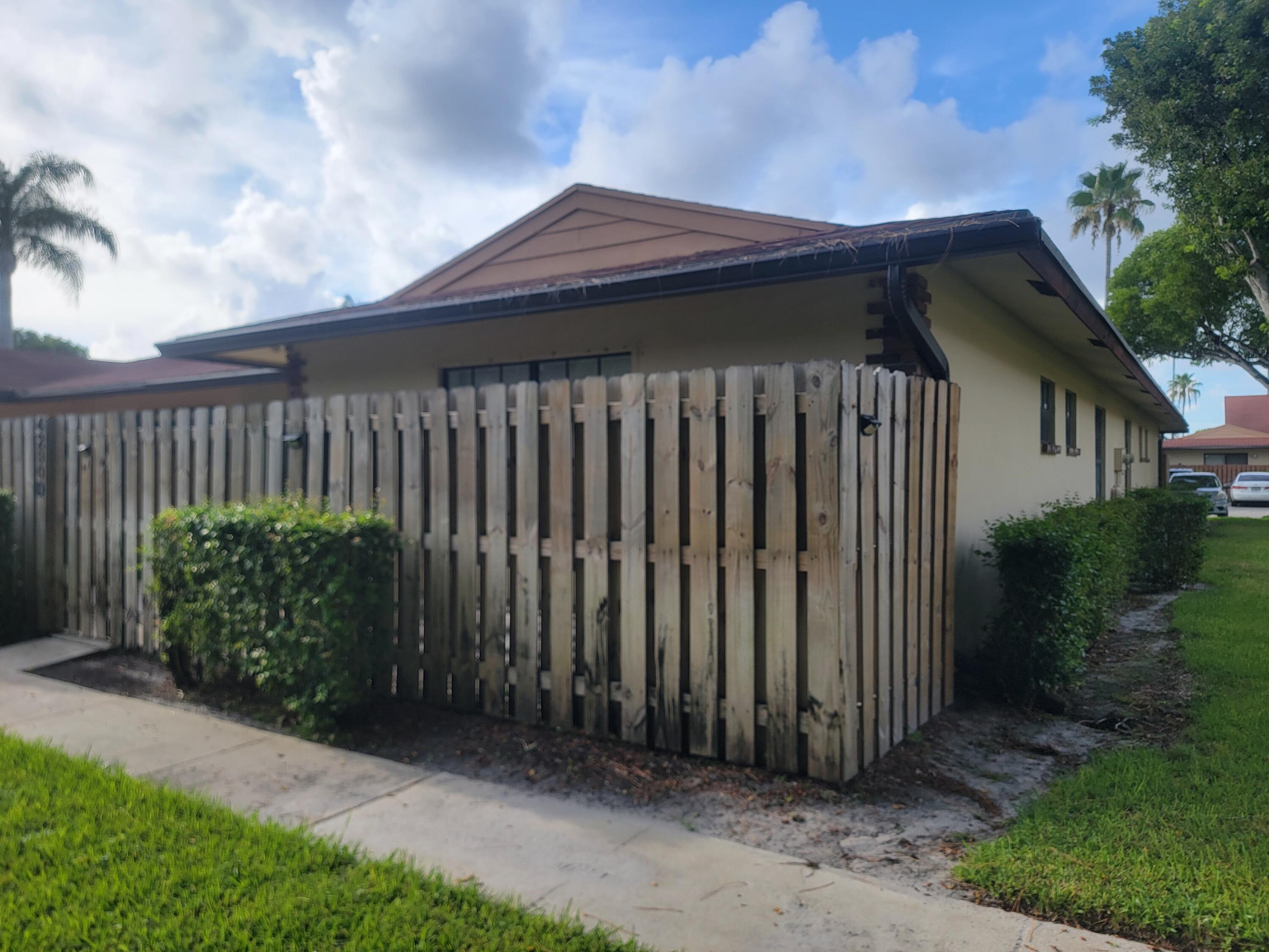 This single-story, 2-bedroom, 2-bath townhouse offers a fantastic blank canvas for your vision. It includes 2 dedicated parking spaces and a layout ready for your personal cosmetic updates. The home has tile flooring in the main areas, with one room prepped for the new flooring of your choice. Enjoy a carefree lifestyle with an HOA of $315/mo that covers pool, lake, and exterior property maintenance.