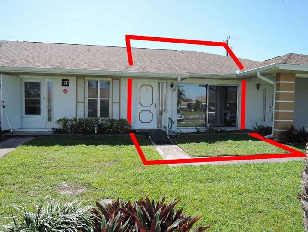 Photo of 1231 S Lakes End Drive #Apt C, Fort Pierce, FL 34982 (MLS # R10699258)