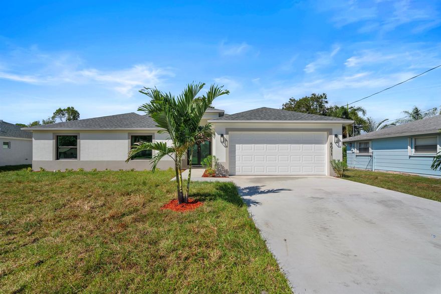 New Home MOVE-IN READY! No HOA! This stunning 4-bedroom, 3-bathroom home offers a modern open-plan layout. Featuring tile flooring throughout, including the back porch and entry floor, this home is filled with natural light, thanks to big impact windows, doors, and garage door. Low E Windows. The spacious kitchen includes quartz countertops, stainless steel appliances, and a large pantry. The luxurious master suite boasts a spa-like bathroom with a free-standing bathtub, shower, dual sinks, and a spacious walk-in closet. The back porch with ample space comes with water and electrical connections ready for you to install a Summer Kitchen.