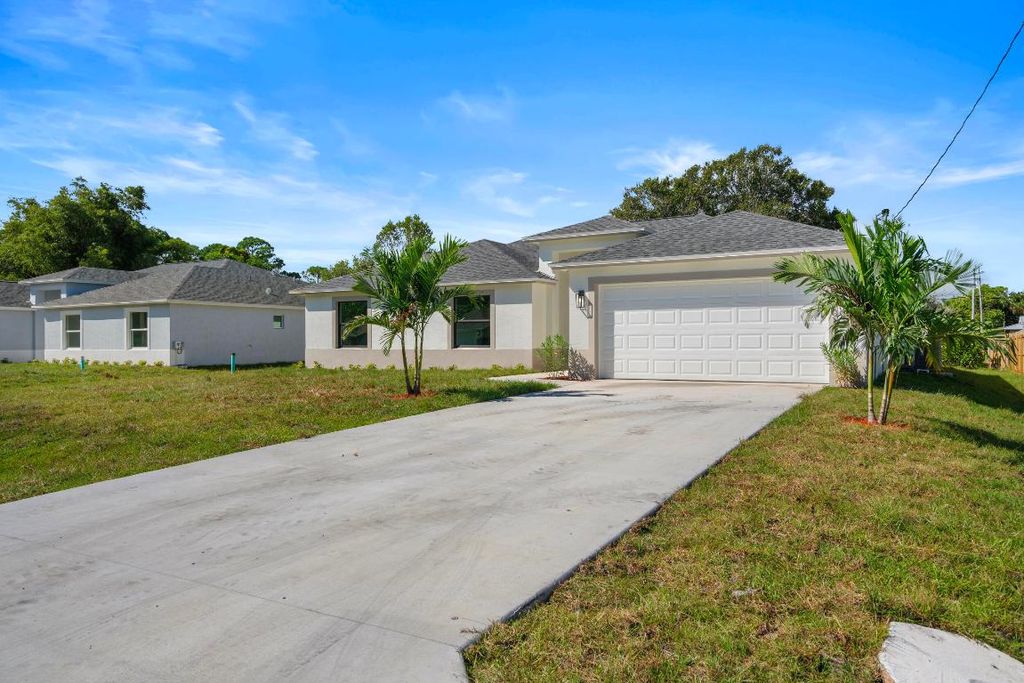 Photo of 6011 Bamboo Drive, Fort Pierce, FL 34982 (MLS # R11134415)