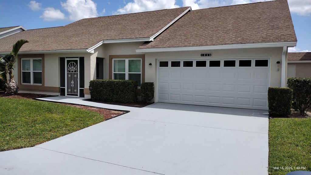 Photo of 1056 NW Tuscany Drive, Port Saint Lucie, FL 34986 (MLS # R11088275)
