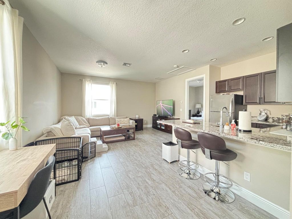 Photo of 5053 Grandiflora Road #A, Palm Beach Gardens, FL 33418 (MLS # R11123608)