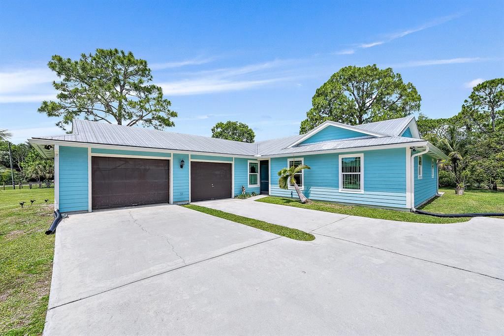 Photo of 9735 154th Road N, Jupiter, FL 33478 (MLS # R10889382)