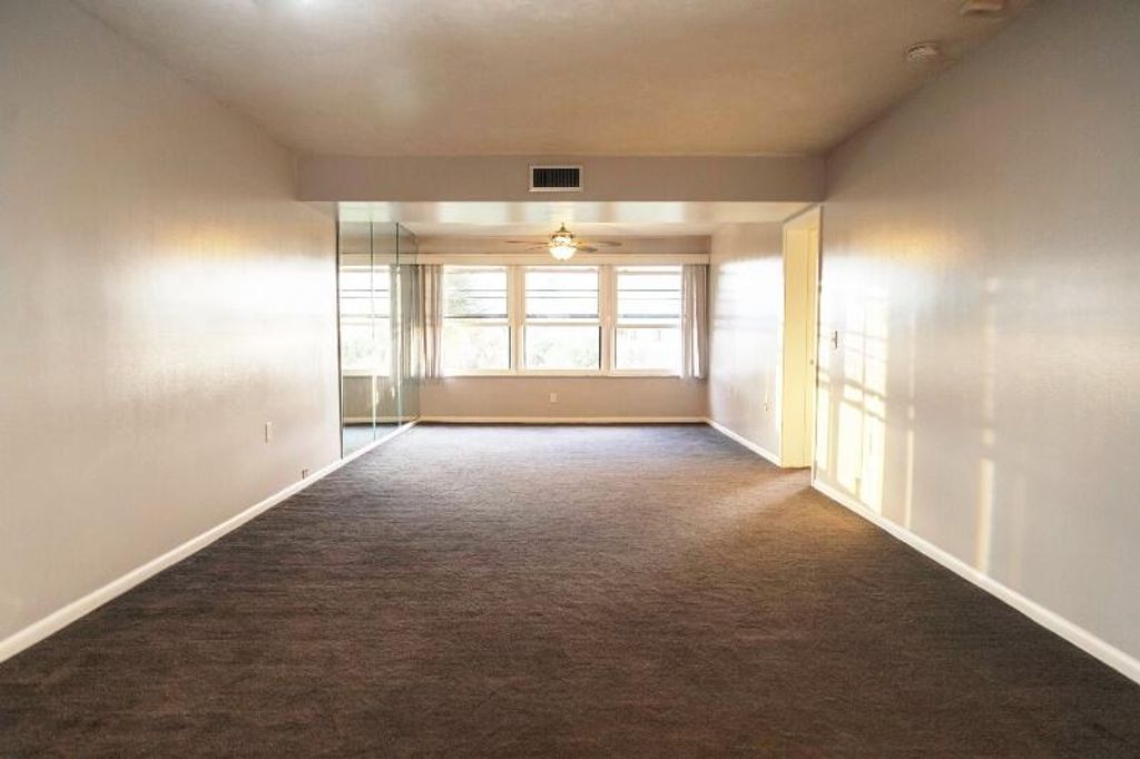 Photo of 3511 Village Boulevard #402, West Palm Beach, FL 33409 (MLS # R11046373)