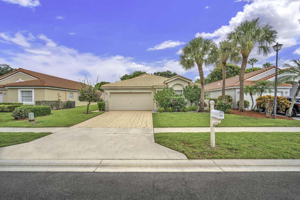Photo of 5707 Swaying Palm Lane, Boynton Beach, FL 33437 (MLS # B26054338)