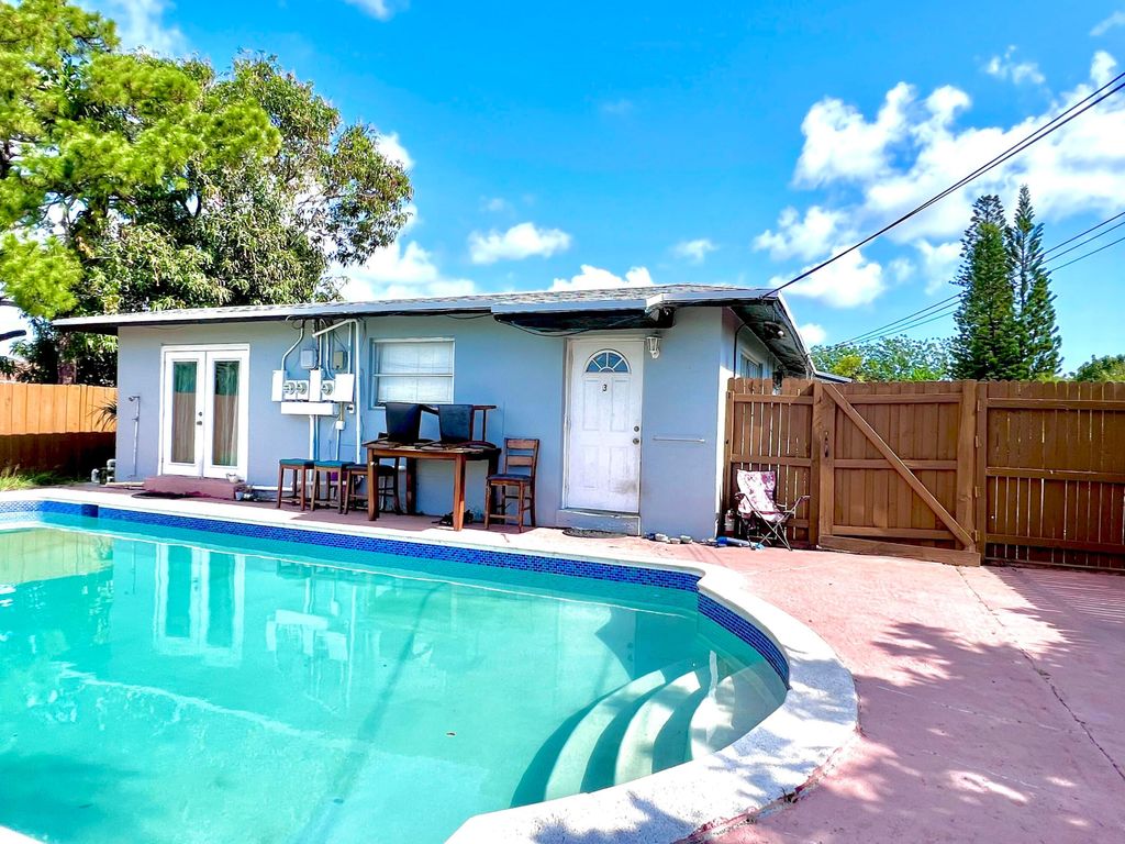 Photo of 824 Bayberry Drive #1, 2, &amp; 3 : Triplex, Lake Park, FL 33403 (MLS # R10989317)