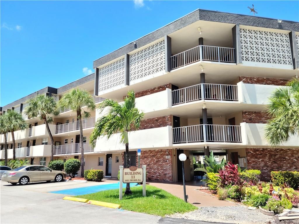 Photo of 3051 NW 46th Ave Ave #402, Lauderdale Lakes, FL 33313 (MLS # F10338968)