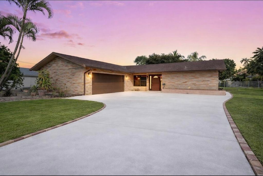 Photo of 356 Sandpiper Avenue, Royal Palm Beach, FL 33411 (MLS # R11169932)