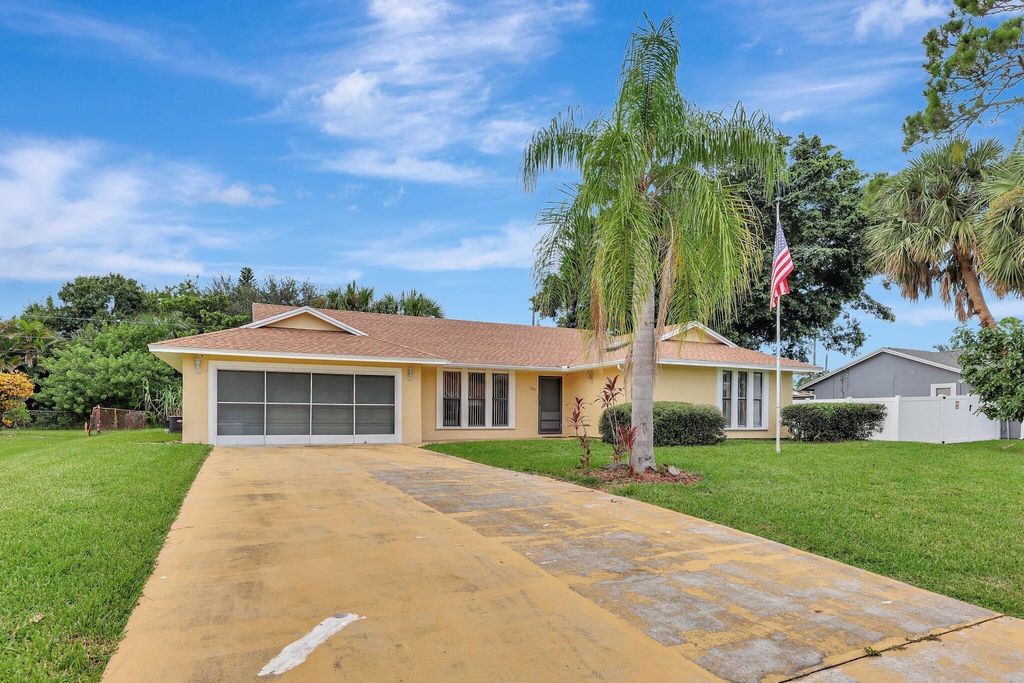Photo of 1045 SW Fenway Road, Port Saint Lucie, FL 34953 (MLS # R11011941)