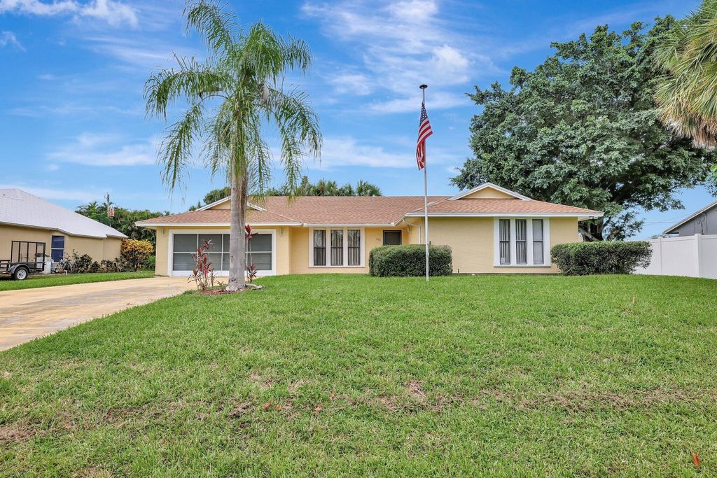 Photo of 1045 SW Fenway Road, Port Saint Lucie, FL 34953 (MLS # R11011941)