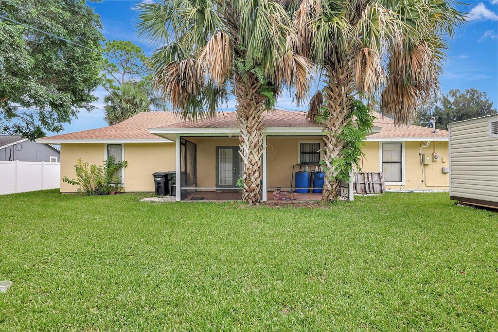 Photo of 1045 SW Fenway Road, Port Saint Lucie, FL 34953 (MLS # R11011941)