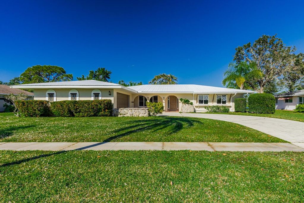 Photo of 1425 SE Sunshine Avenue, Port Saint Lucie, FL 34952 (MLS # R11050764)