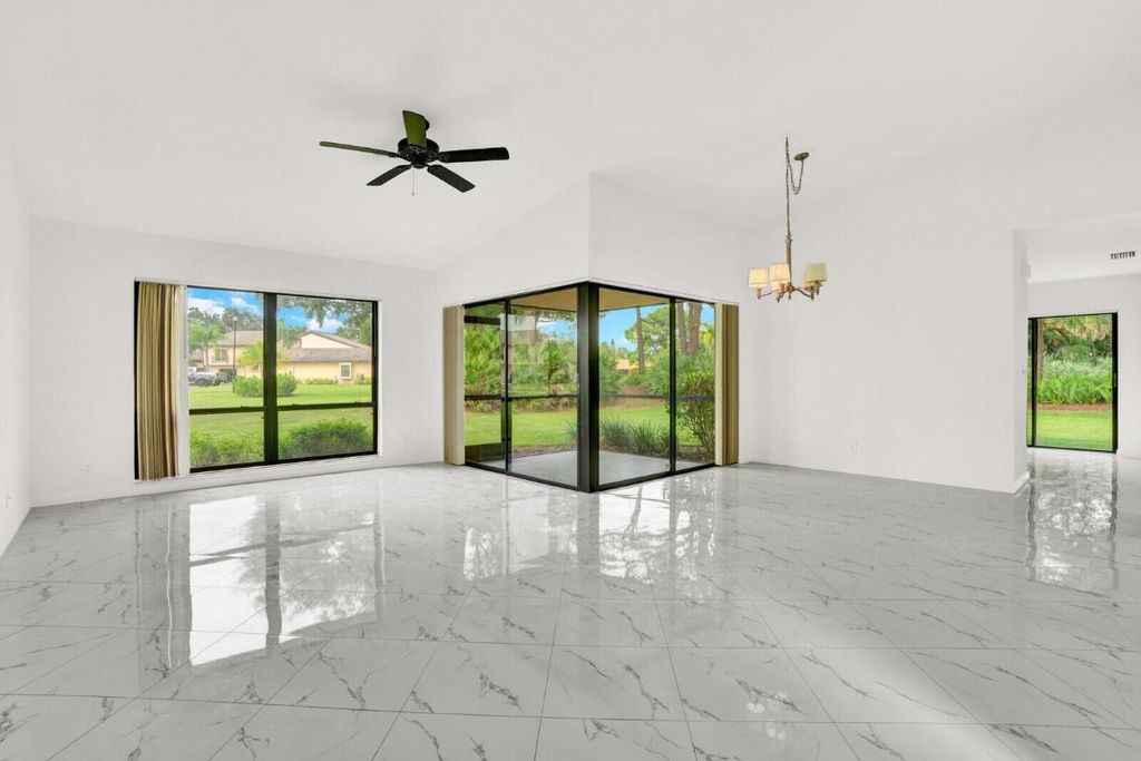 Photo of 3705 SW Quail Meadow Trail #E, Palm City, FL 34990 (MLS # R11144141)