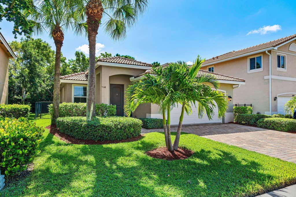 Photo of 5613 Caranday Palm Drive, Greenacres, FL 33463 (MLS # B26064001)