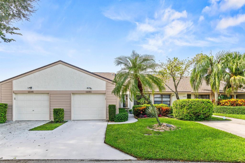 Photo of 12311 Forest Greens Drive, Boynton Beach, FL 33437 (MLS # R11126688)