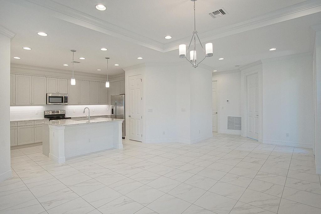 Photo of 24060 SW Firenze Way, Port Saint Lucie, FL 34986 (MLS # R10998468)