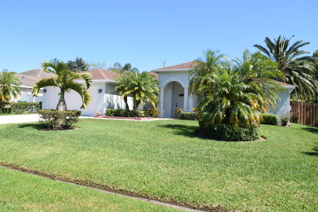 Photo of 1074 SW Janar Avenue, Port Saint Lucie, FL 34953 (MLS # R11105756)