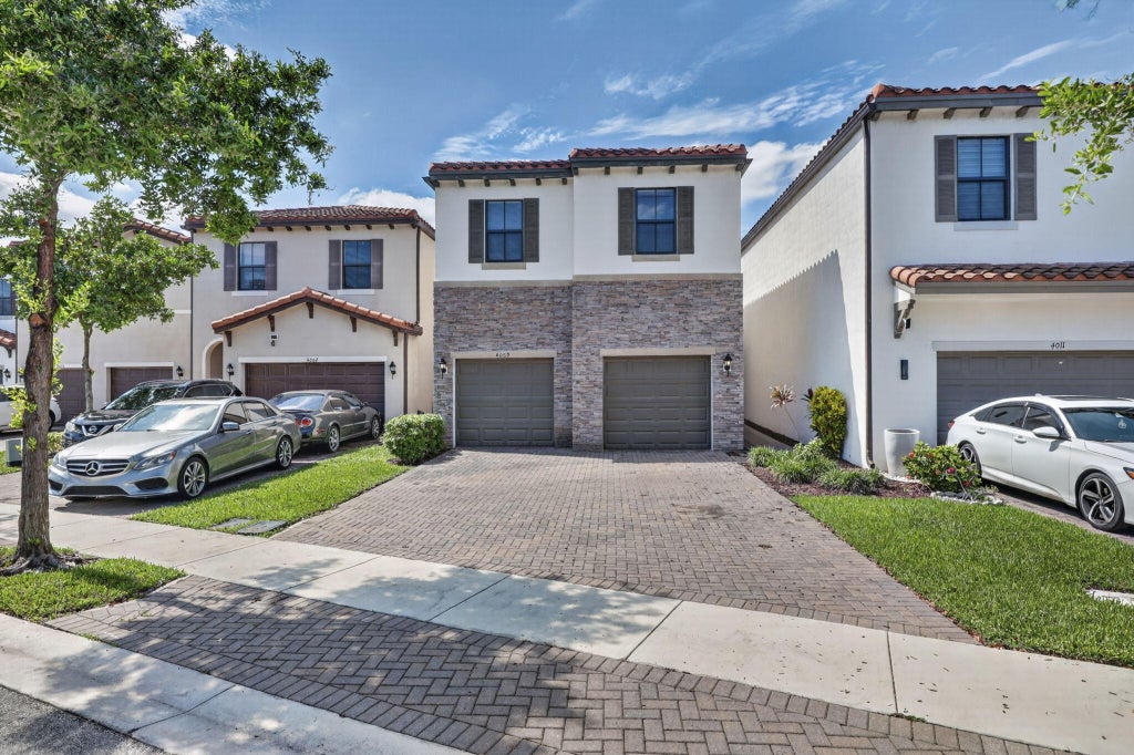 Photo of 4009 SEQUOIA Place, Riviera Beach, FL 33410 (MLS # B26088828)