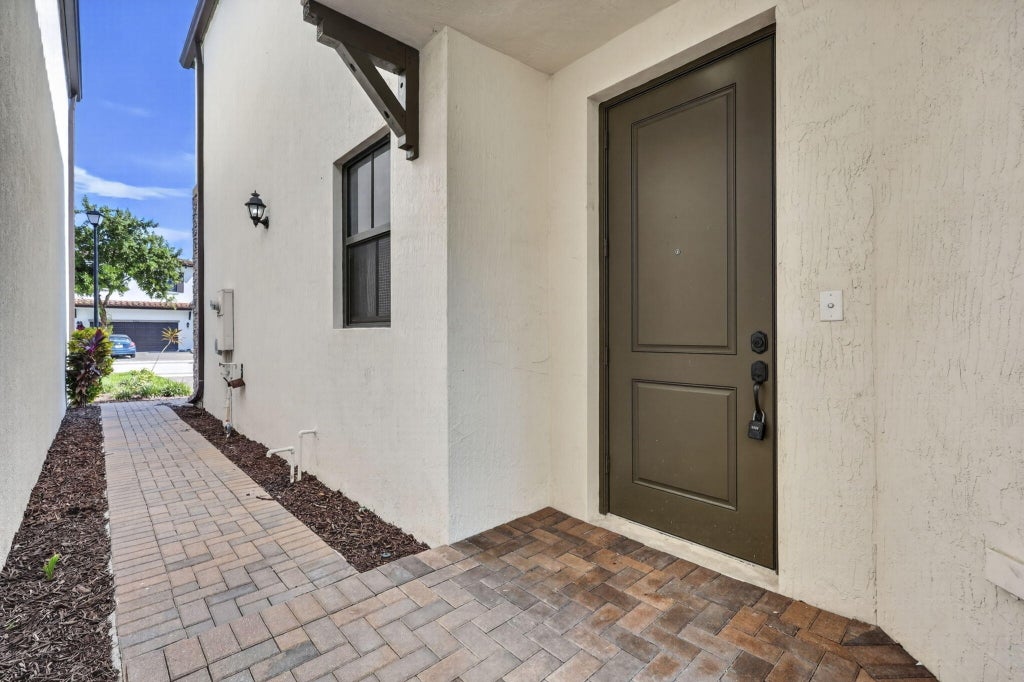 Photo of 4009 SEQUOIA Place, Riviera Beach, FL 33410 (MLS # B26088828)
