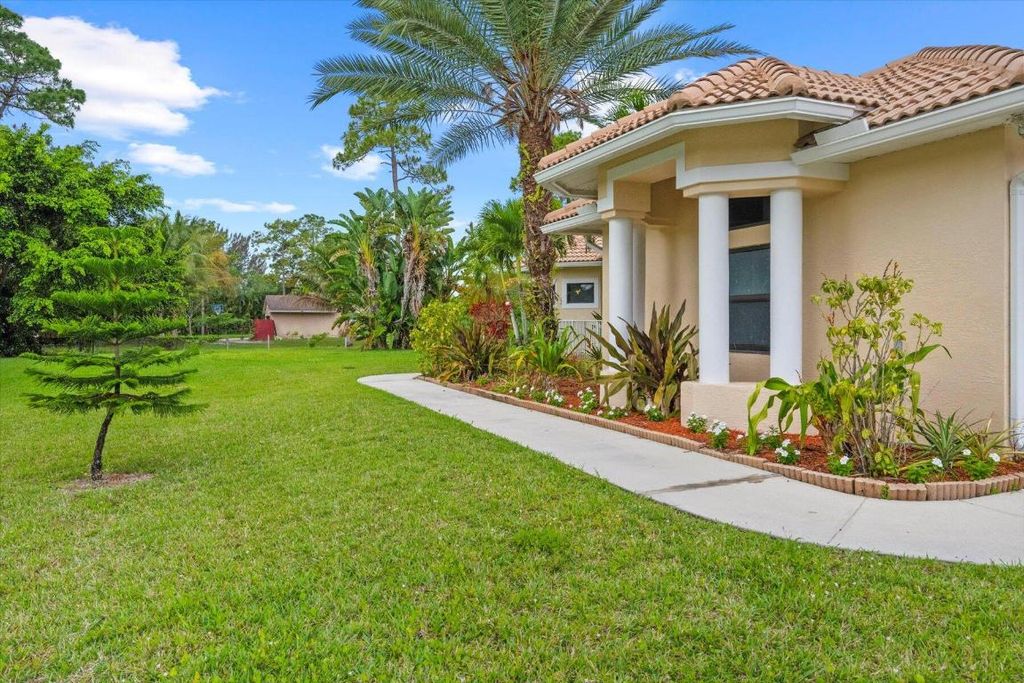 Photo of 14315 83rd Lane N, Loxahatchee, FL 33470 (MLS # R10947673)