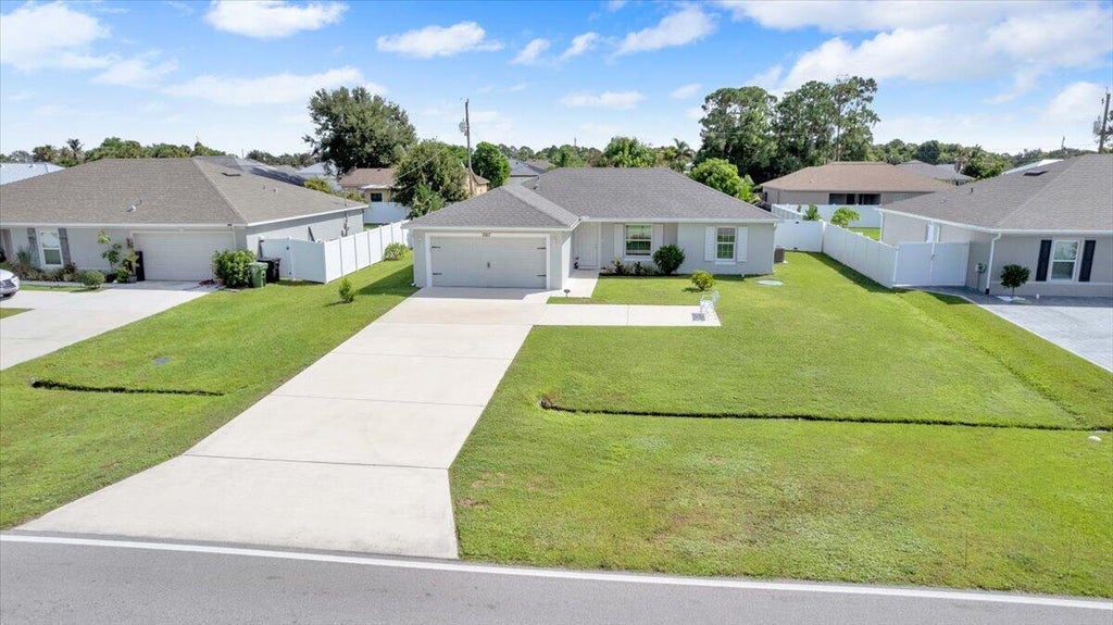 Photo of 3957 SW SAVONA Boulevard, Port Saint Lucie, FL 34953 (MLS # B26079036)