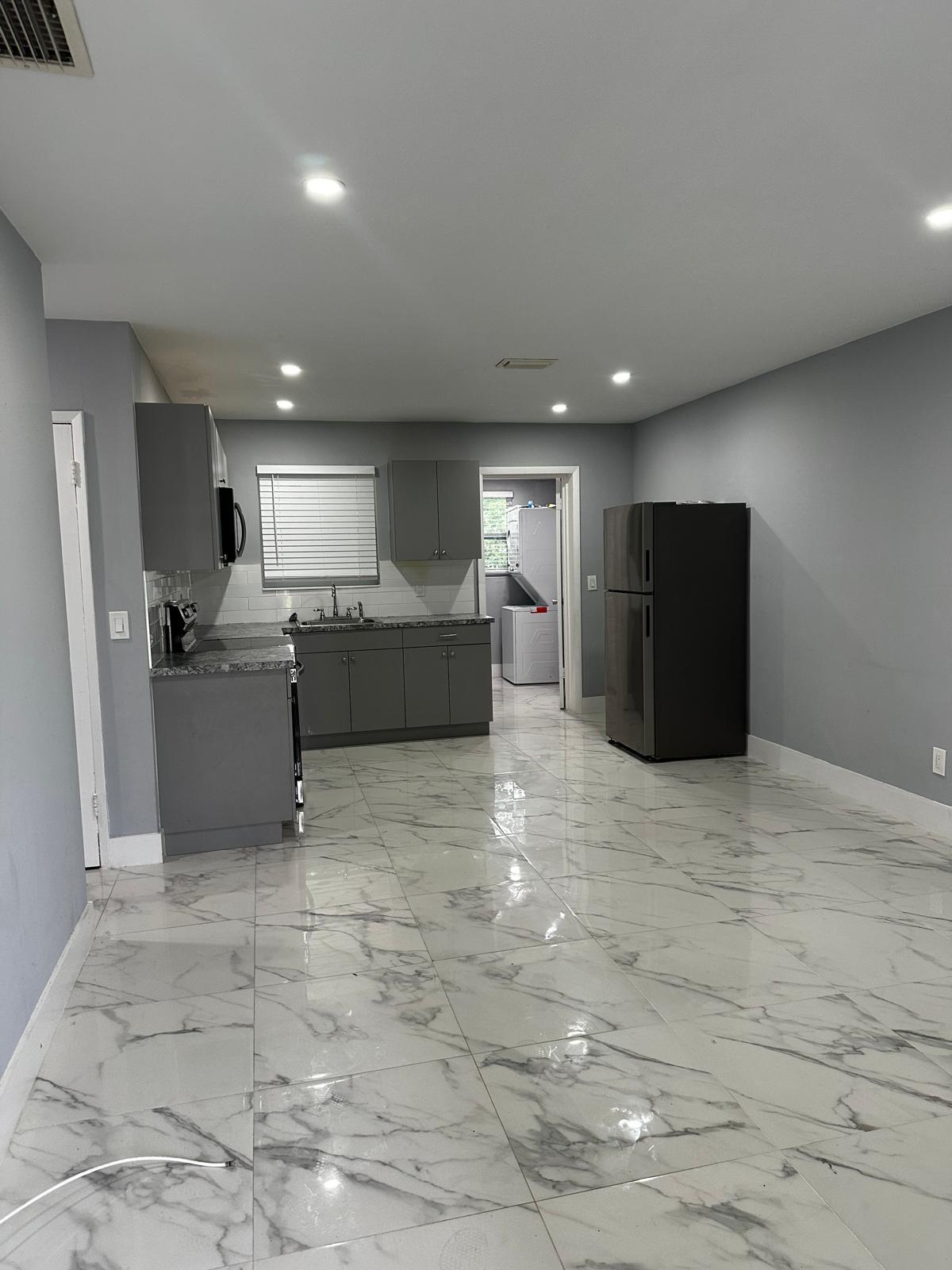 Enjoy modern comfort in this fully renovated 1 bedroom, 1 bathroom apartment. Features include a private backyard, in-unit washer and dryer, open floor plan with ample natural light, updated kitchen with new appliances, and a stylish bathroom with contemporary fixtures.Pet-friendly with deposit. Off-street parking. Convenient location near shopping, dining, and entertainmentEasy access to highways for a quick commute to Fort Lauderdale.