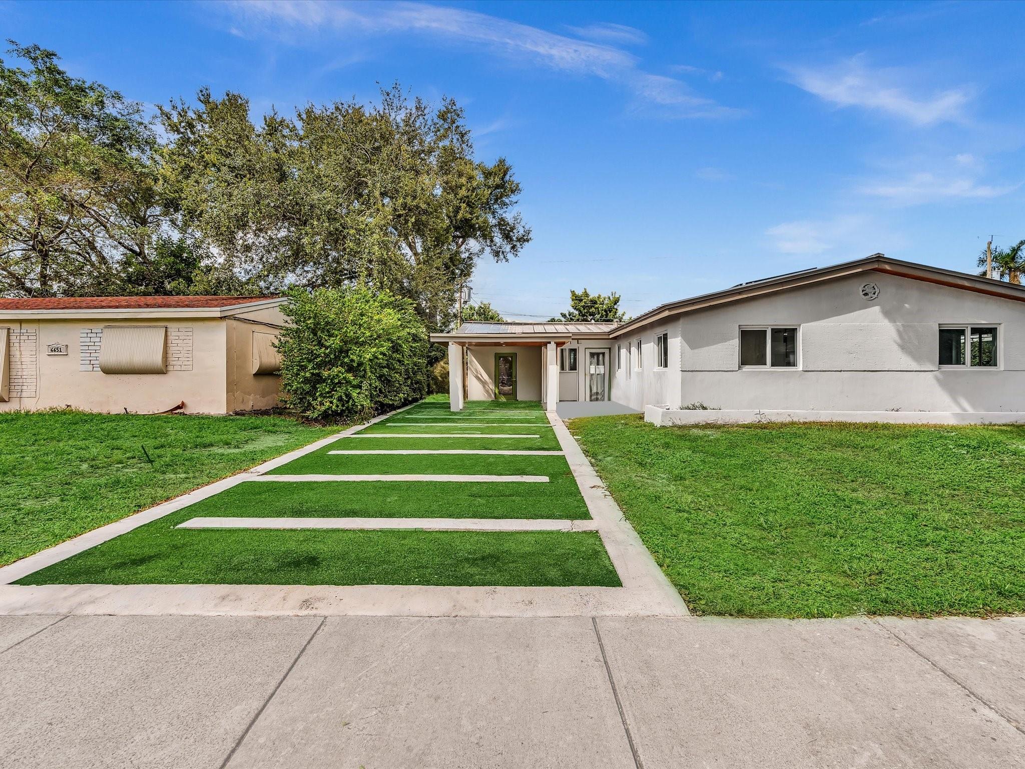 This stunning 4-bedroom, 2-bathroom home is move-in ready and packed with upgrades! Featuring a brand new roof, new floors, and hurricane impact windows, this property offers peace of mind and modern comfort. The remodeled kitchen boasts a large island, all brand-new appliances, and sleek finishes, perfect for entertaining. Both bathrooms have been tastefully remodeled, and every closet is fitted with stylish barnyard doors.
Enjoy the spacious living room, dining room, and laundry room, along with a large carport and extended driveway. Energy-efficient solar panels add incredible value and savings. Located just 5 minutes from the Hollywood Hard Rock Hotel, gaming, and casino, this home has it all – space, style, and convenience.
Best of all, NO HOA!