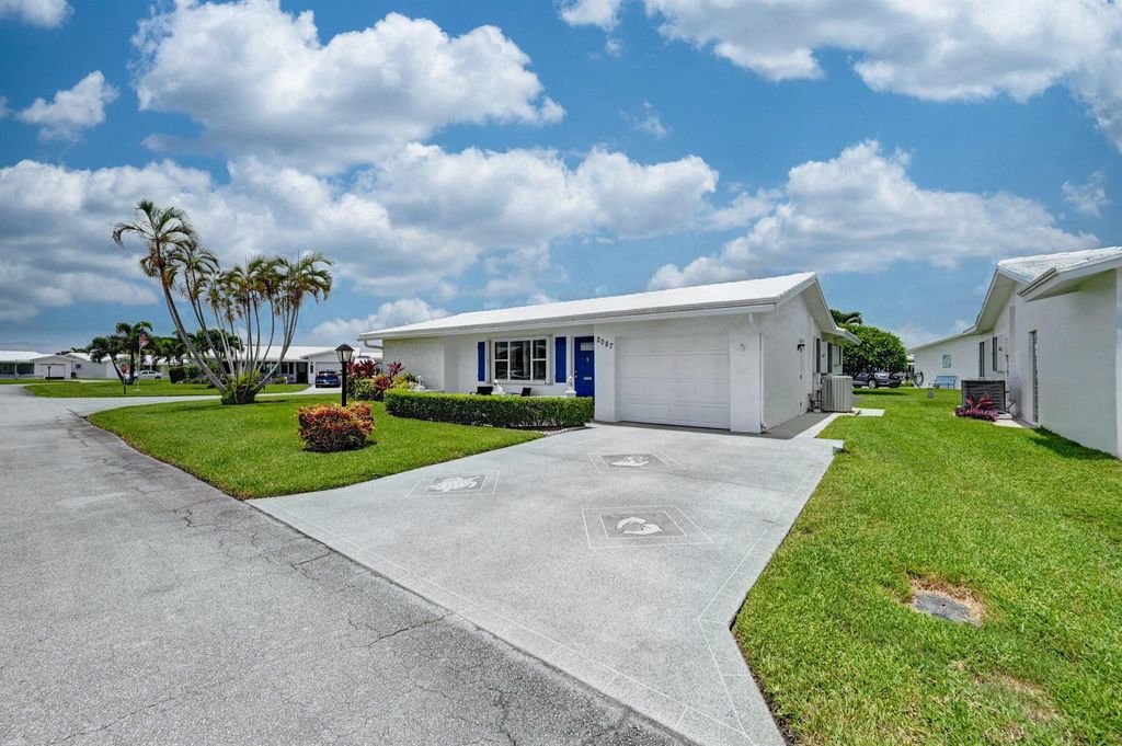 Photo of 2087 SW 12th Avenue, Boynton Beach, FL 33426 (MLS # R11110921)