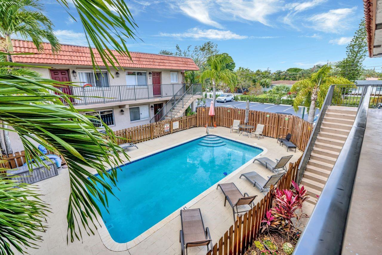 This charming two-bedroom, one-bathroom condominium offers approximately 788 square feet of living space in a well-maintained community. Corner unit on an open layout provide a spacious and airy feel, perfect for those who appreciate a flexible floor plan. Electric panel has been replaced and also has been freshly painted. Residents can enjoy the heated pool, providing a refreshing escape on warm or even wintertime. Also, the recently repaved parking features two parking spaces per unit and plenty of guest spots ensuring convenient access for owners and visitors. Ideally located just minutes from Sprouts grocery store, liquor store, 7-Eleven, this home is also just a short drive to the vibrant entertainment of Wilton Drive. Plus, there’s a jogging and dog park few blocks from the building