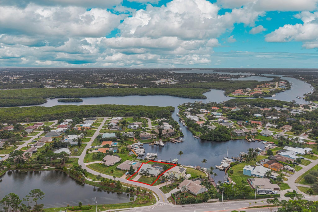 Photo of 718 SE Essex Drive, Port Saint Lucie, FL 34984 (MLS # R11079289)