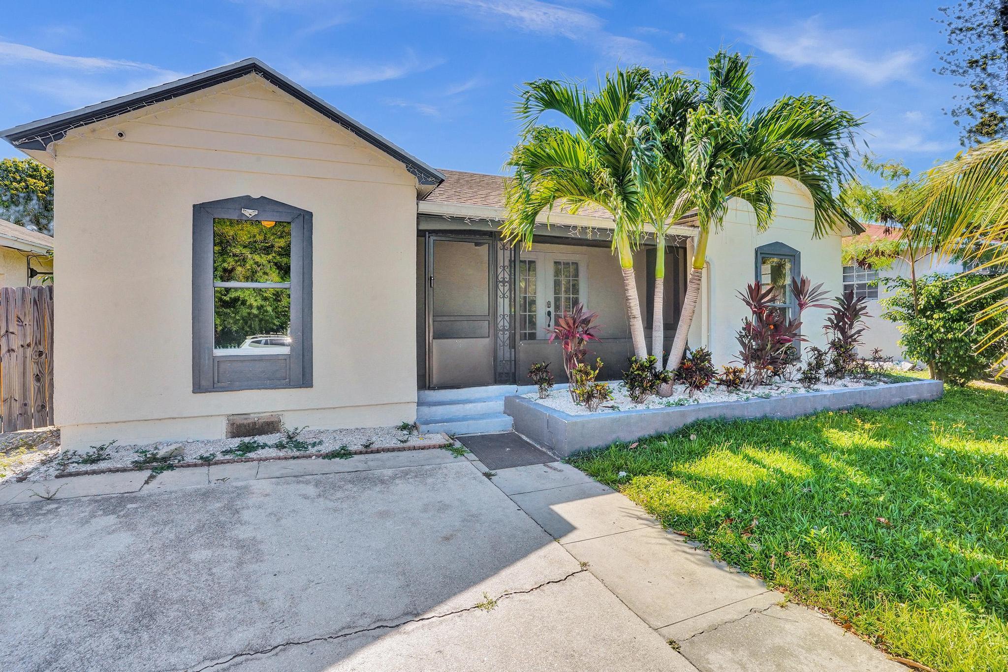 Charming cottage style 3 bed, 2 bathroom & bonus room home with private pool in the heart of Lake Worth Beach, minutes from down town! Redesigned kitchen with granite counter tops & tiled backsplash. Modern plank flooring throughout, covered deck area & back patio, where you can enjoy your morning coffee overlooking the pool. Parking at front & rear of the property, along with a detached garage perfect for converting to in-law suite/guest house/Airbnb/gym or home office. Bonus room overlooking the back yard which could be a guest room/office space & separate laundry room area. Great location for commuters, minutes from I95, as well as the beach with easy access to Palm Beach. Enjoy Lake Worth downtown life, with farmers market, night market, festivals, coffee shops , antique stores