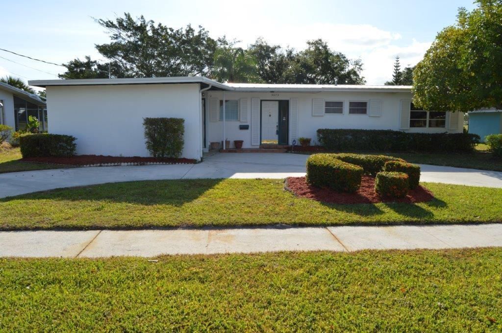 Photo of 3073 SE Morningside Boulevard, Port Saint Lucie, FL 34952 (MLS # R10977127)