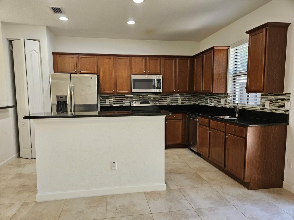 Photo of 9627 Watercrest Isle, Parkland, FL 33076 (MLS # F10504010)
