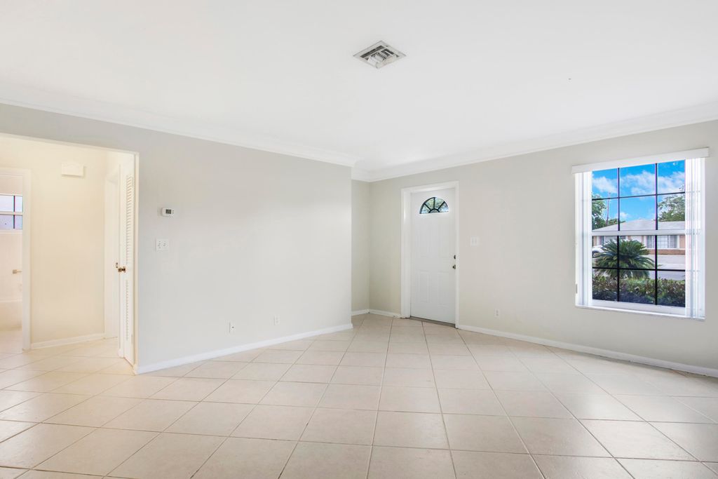 Photo of 527 W Jasmine Drive, Lake Park, FL 33403 (MLS # B26008651)