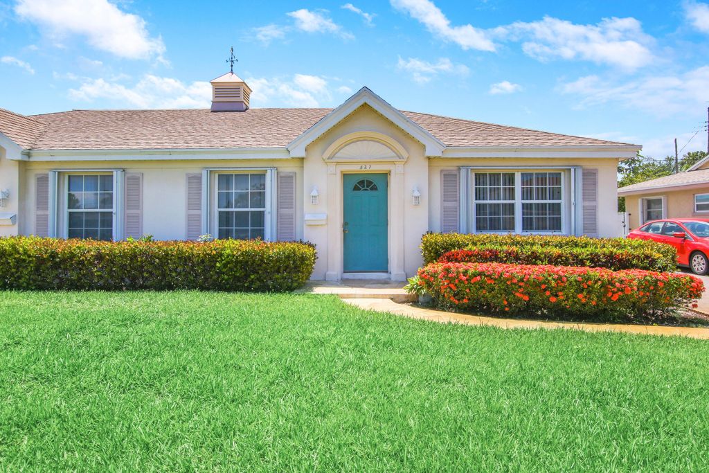 Photo of 527 W Jasmine Drive, Lake Park, FL 33403 (MLS # B26008651)